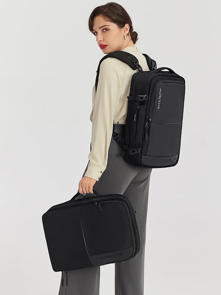 Frau trägt modernen Business Rucksack für Herren & Damen mit Laptopfach und vielen Fächern – ergonomisch, wasserabweisend, ideal für Arbeit, Alltag und Reisen