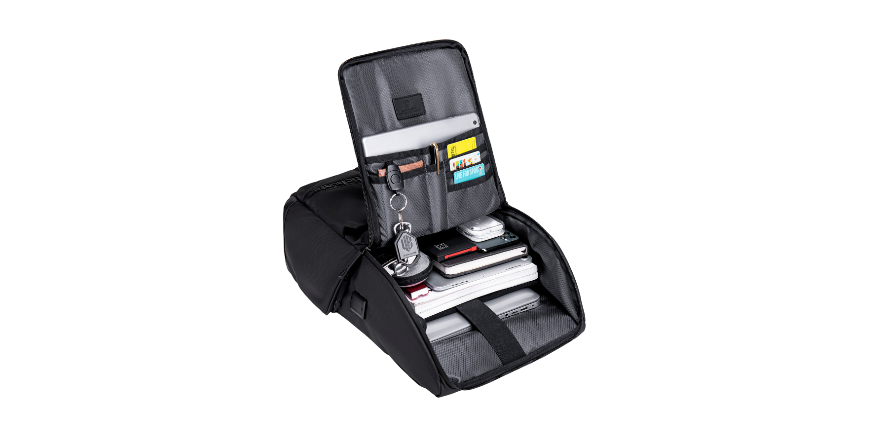 Jet Black Rucksack geöffnet – befüllt und organisiert mit Laptop, Tablet und Zubehör